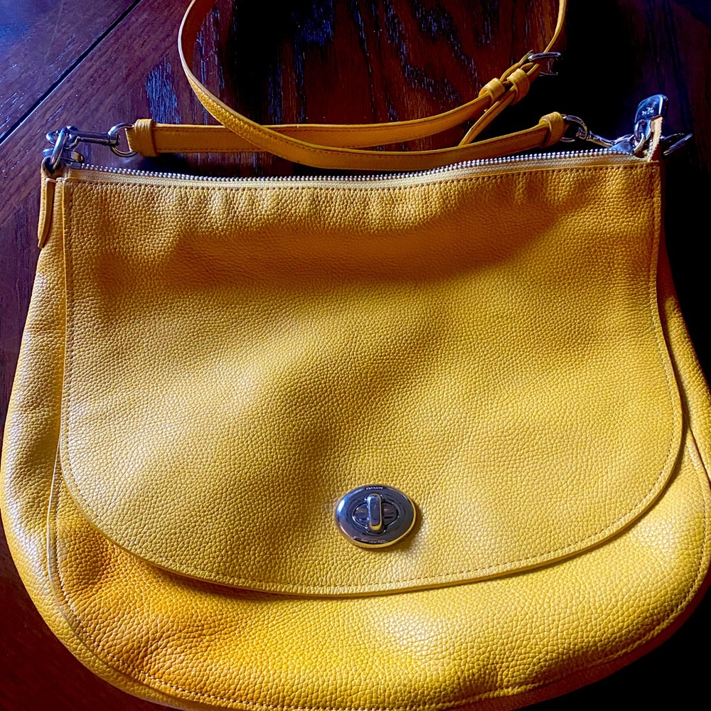 Yellow COACH bag. Some ink staining in lining